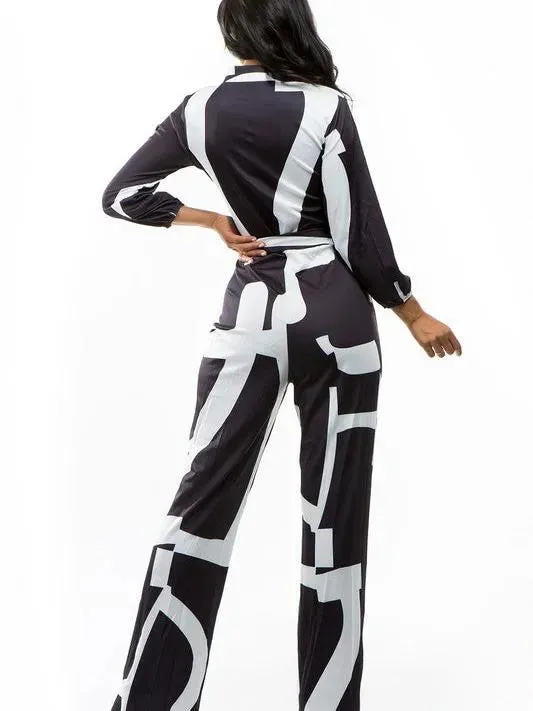 Conquer the World Long Sleeve Belt Tie Satin Jumpsuit
